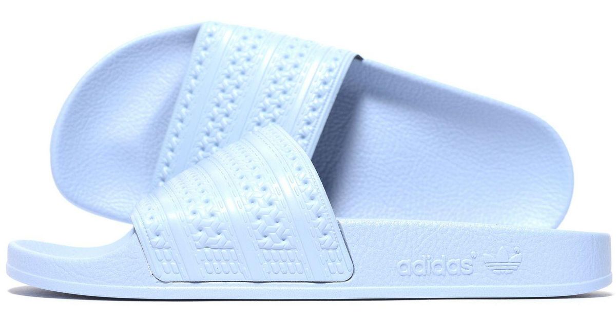 light blue adidas slides