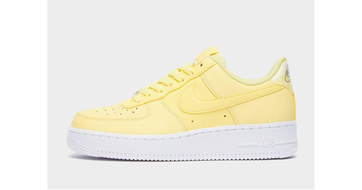 nike air force 1 white with yellow tick