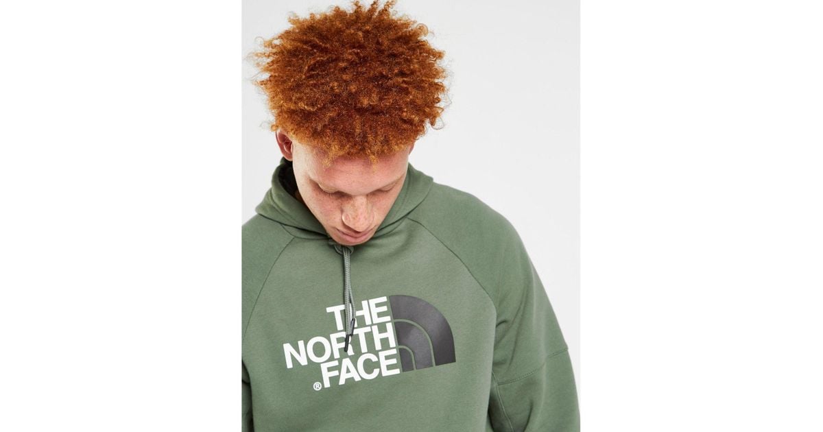 green and black north face hoodie