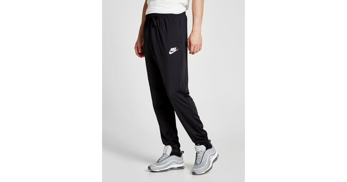 nike division poly track top