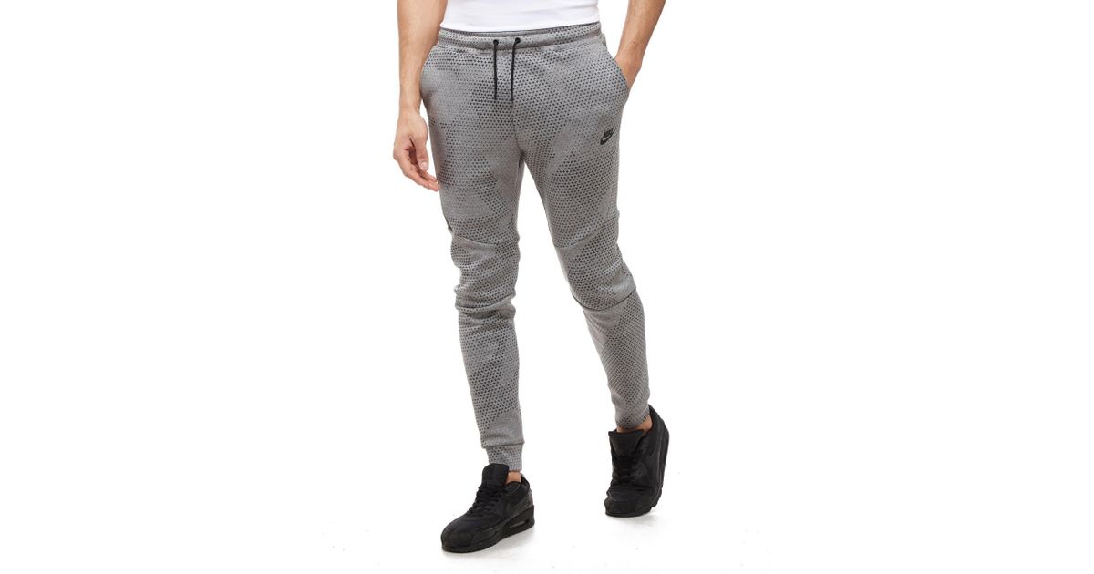 nike tech all over print