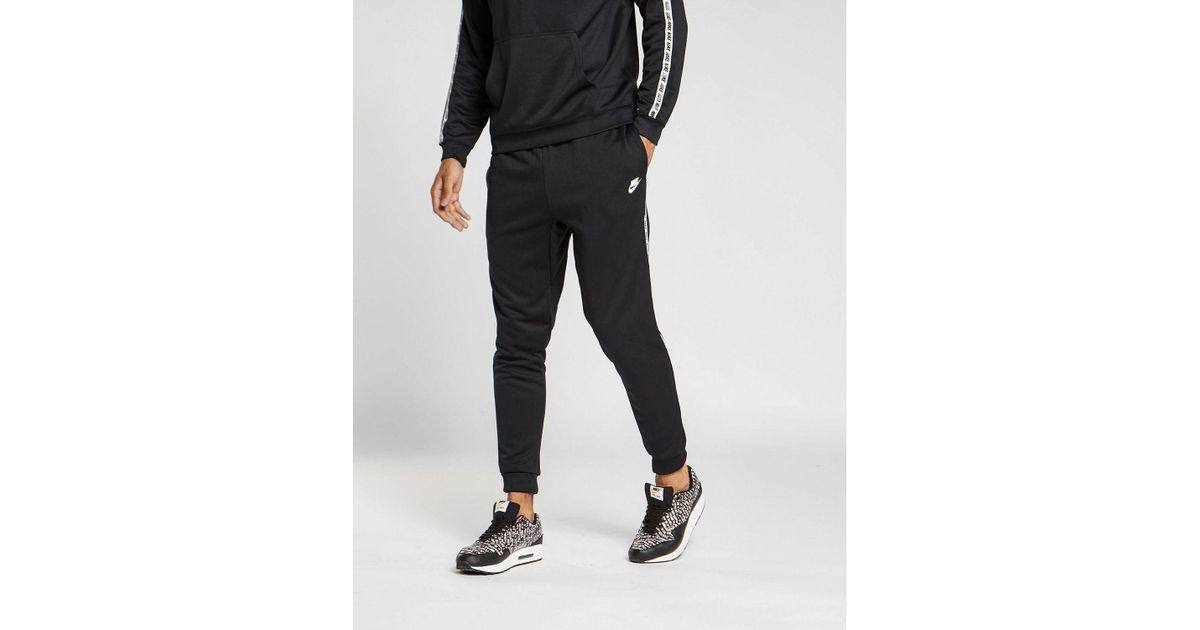 nike gel tape cuffed tracksuit