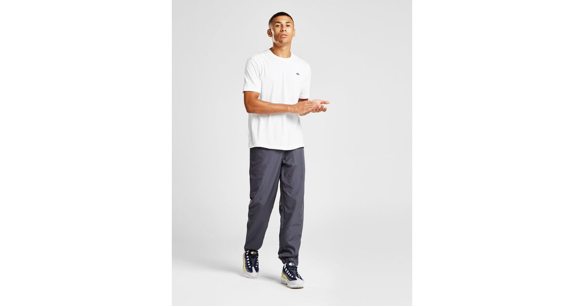 grey lacoste trackies