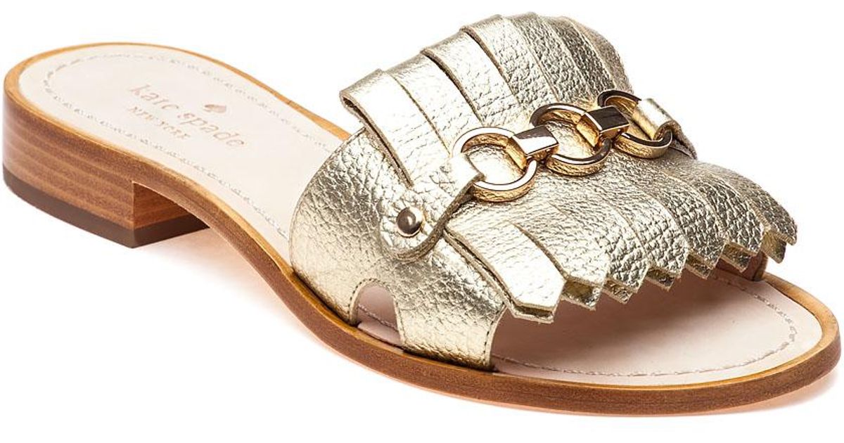 Kate Spade Brie Gold Leather Kiltie Slide Sandals in Metallic | Lyst