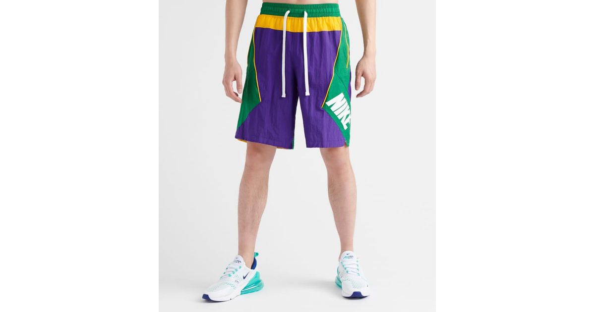 purple and green nike shorts