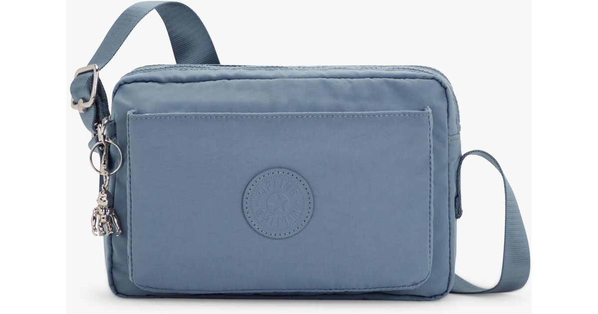 Kipling Abanu Medium Cross Body Bag in Blue | Lyst UK