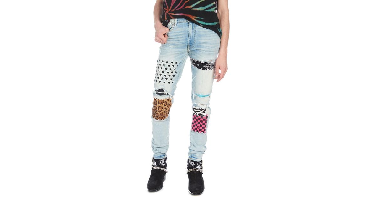 amiri-blue-art-Patch-Jeans.jpeg amiri-blue-art-Patch-Jeans.jpeg