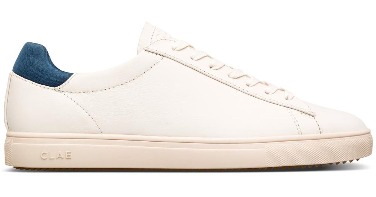 clae bradley triple white leather