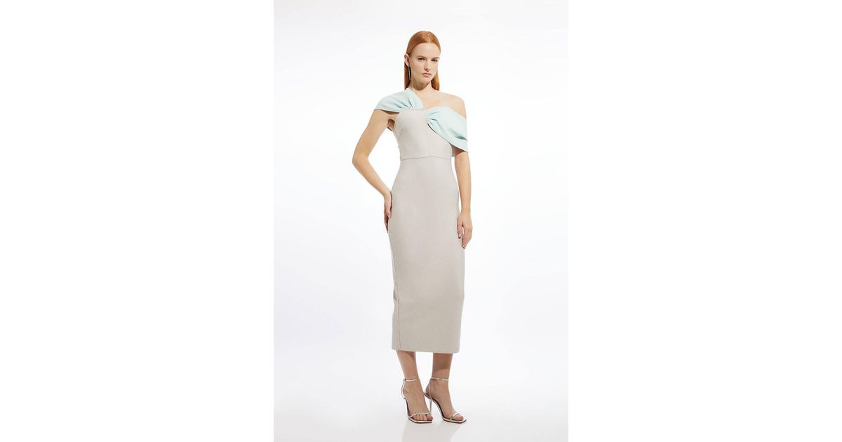 figure form bandage asymmetric strap knit midi dress Karen Millen in White Prettylittlething