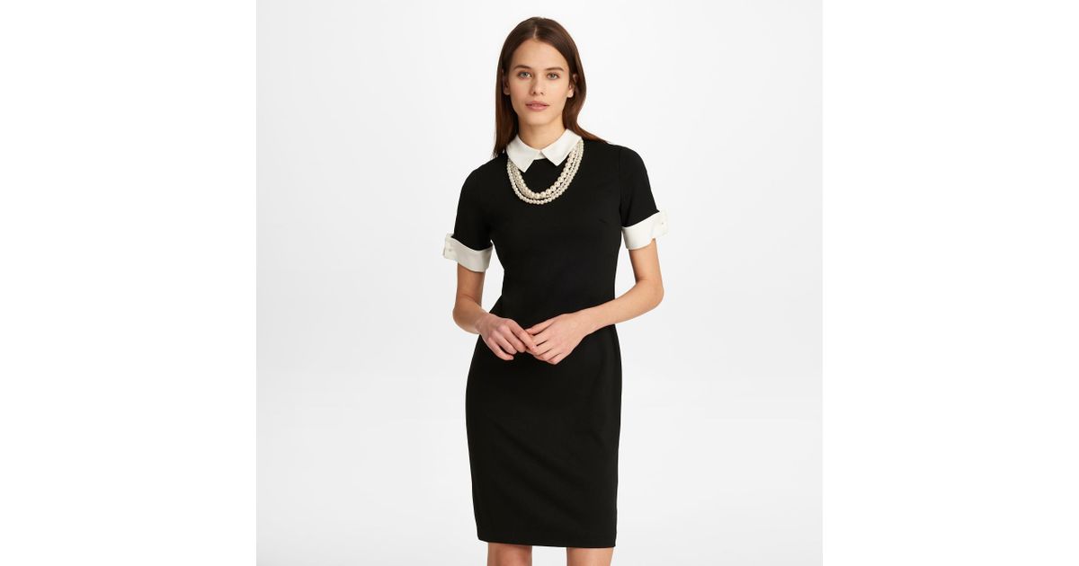 black dress with pearl neckline