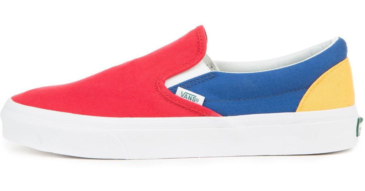 red blue yellow slip on vans