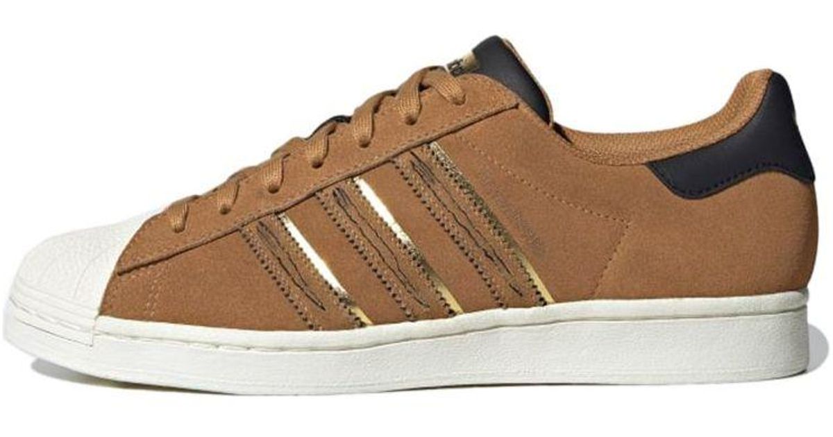brown adidas superstar