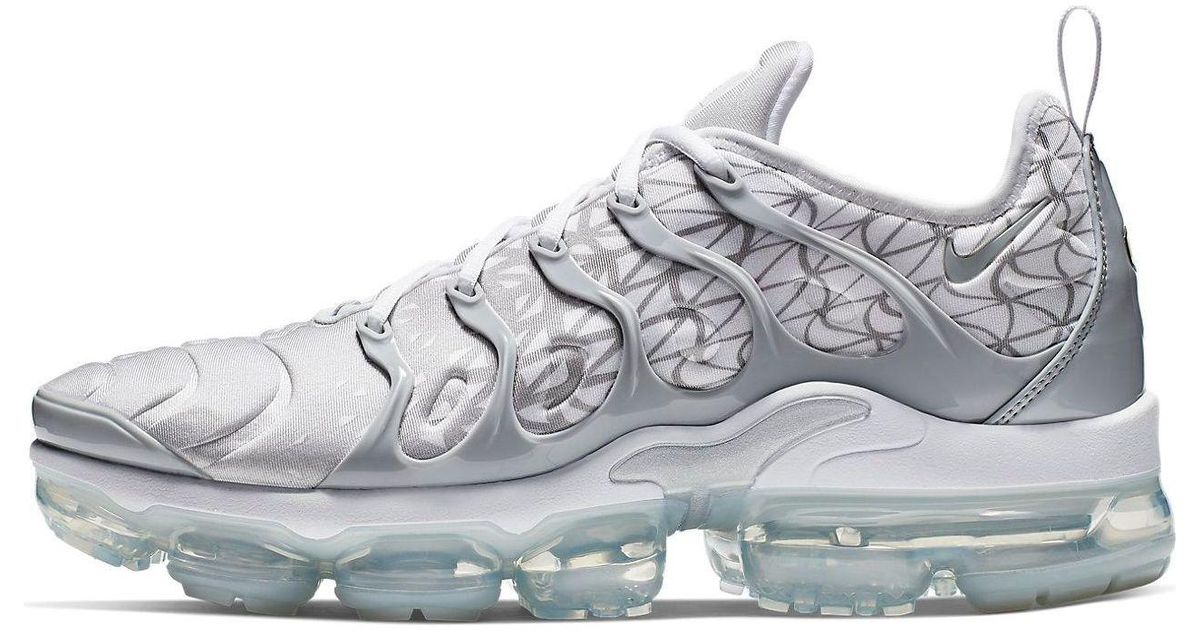 grey and white vapormax plus