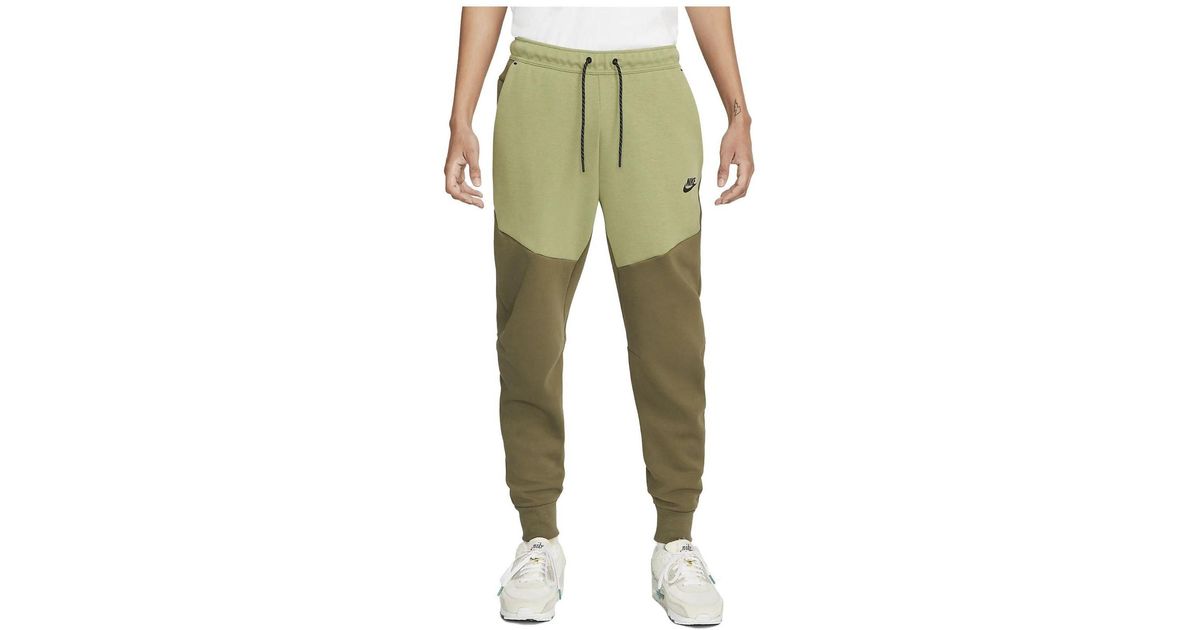green nike tech fleece joggers