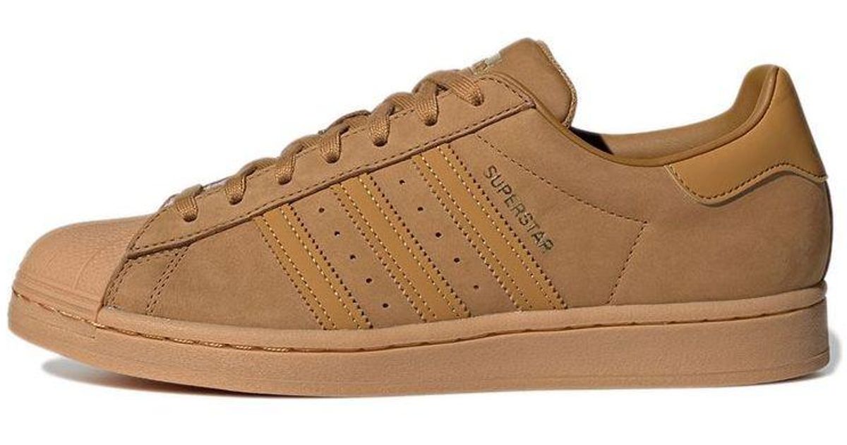 brown adidas superstar