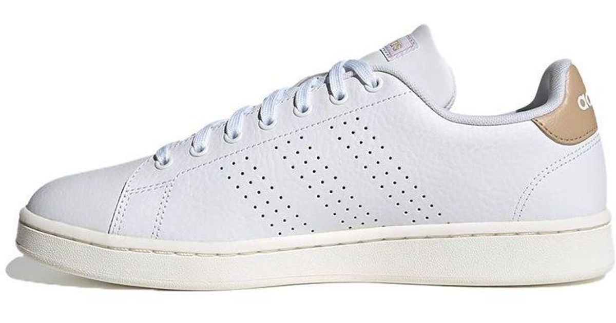 triple white adidas shoes