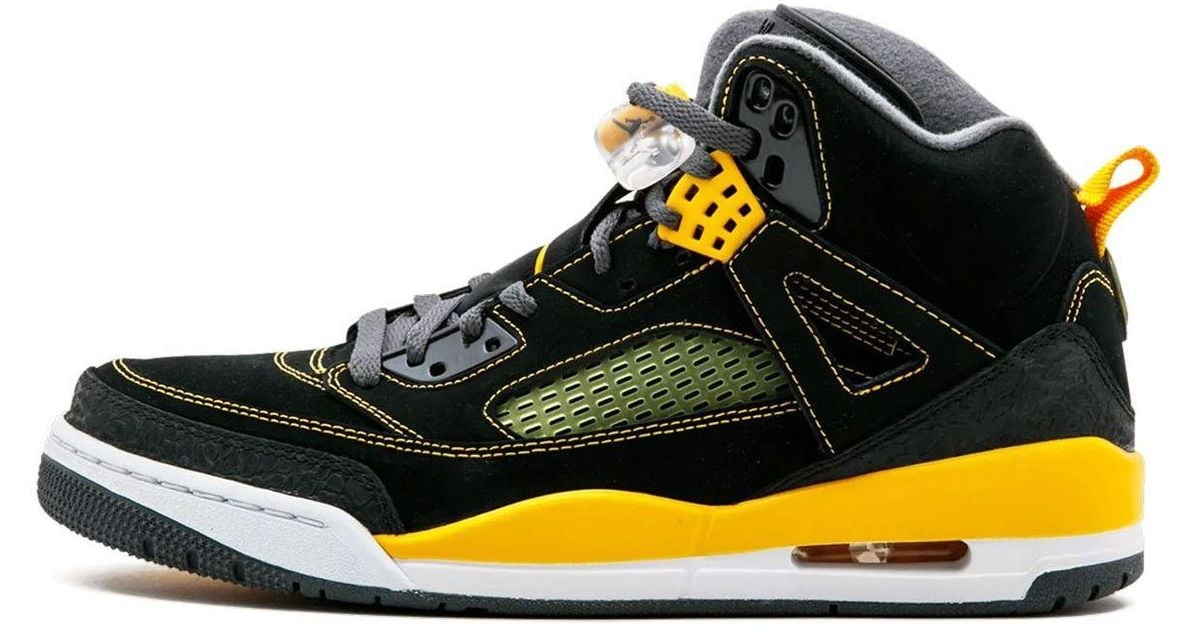 university gold and black jordans