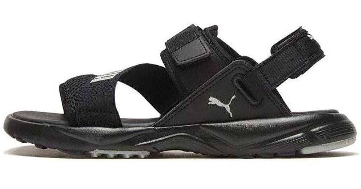 PUMA Js Trali Sandal Sandals in Black | Lyst