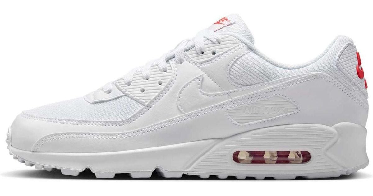 white nike air max with red