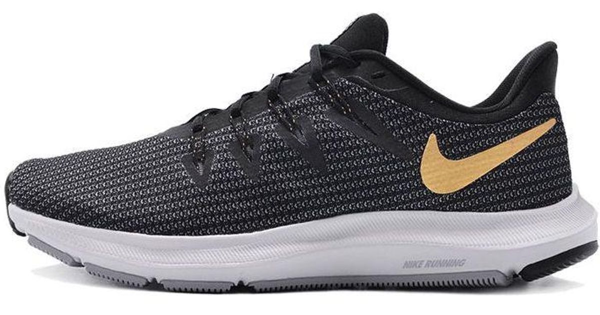 nike quest black gold