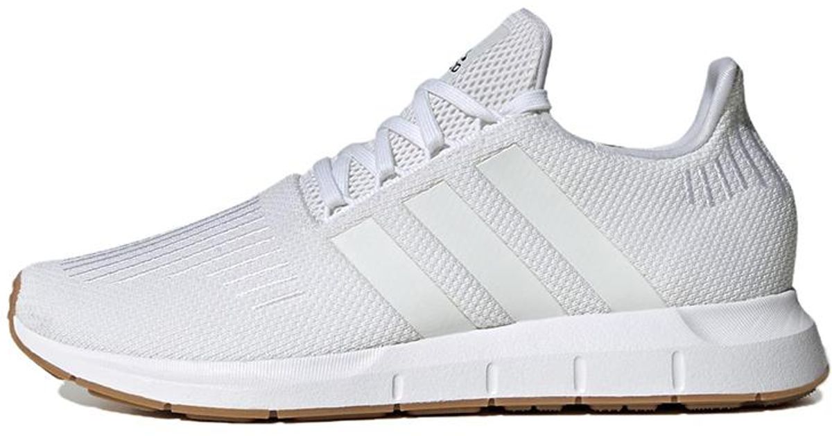 white adidas swift run mens
