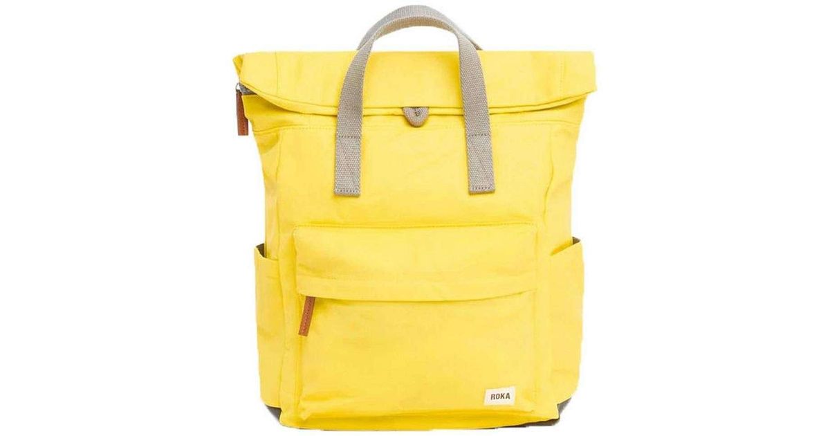 Roka Canfield B Small Sustainable Nylon Backpack in Yellow | Lyst