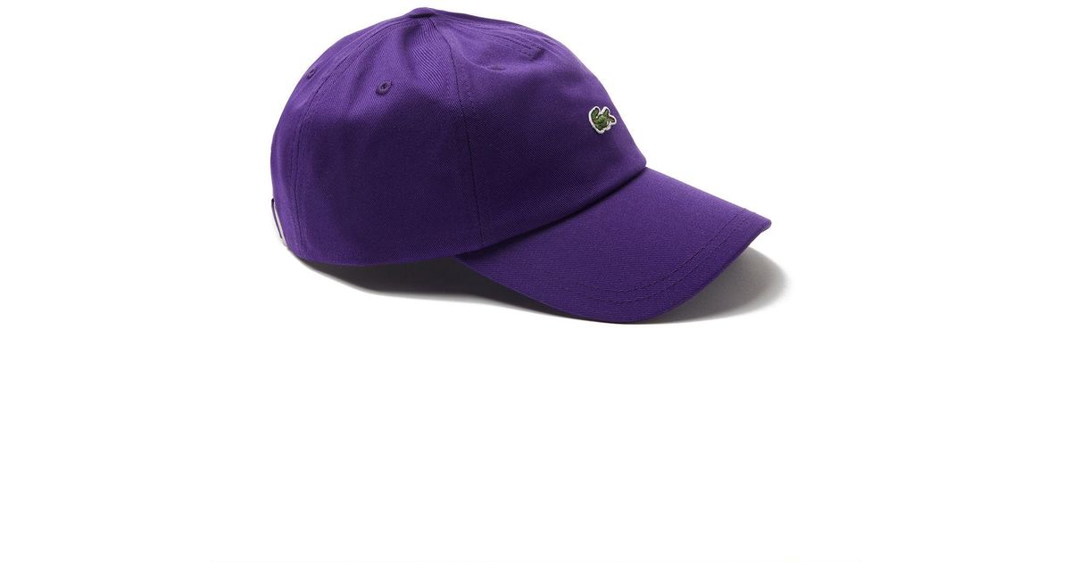 purple lacoste hat