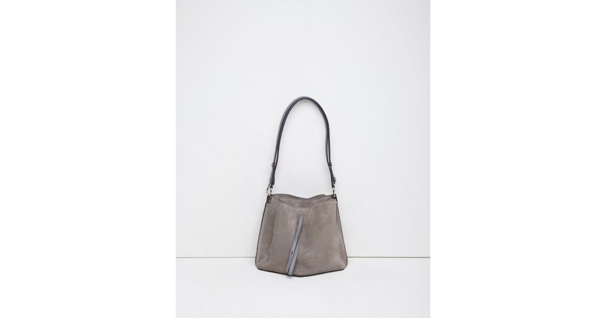 light grey suede handbag