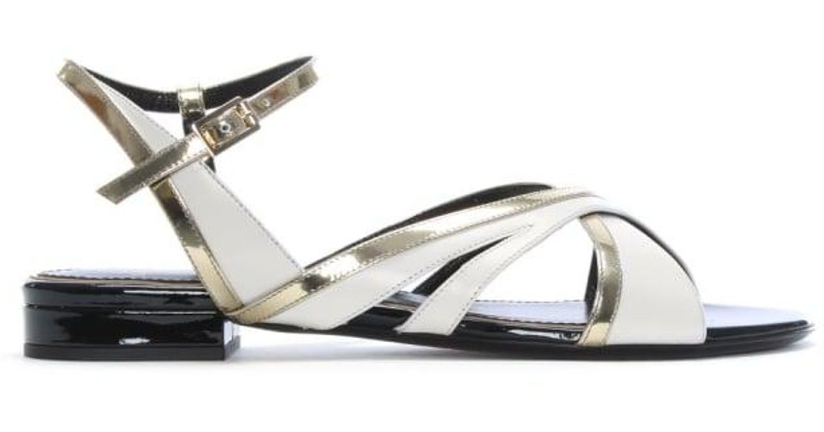 white and gold flat sandals