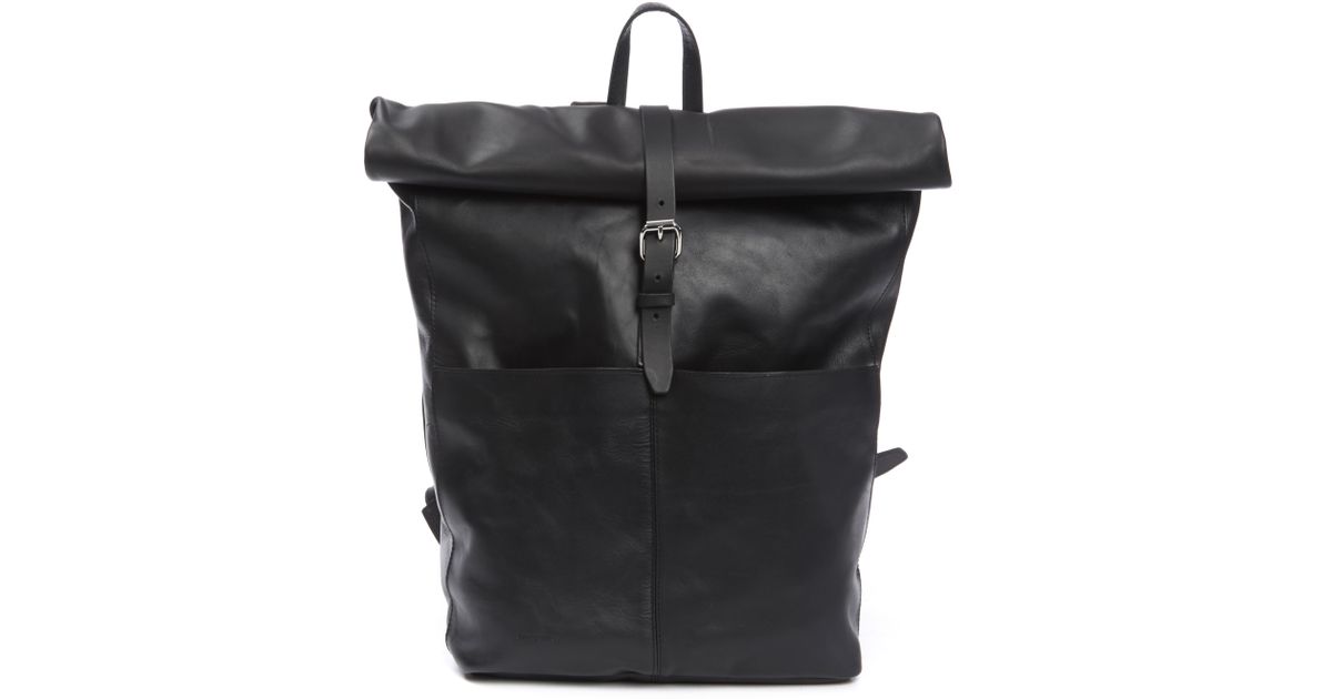 leather rolltop backpack