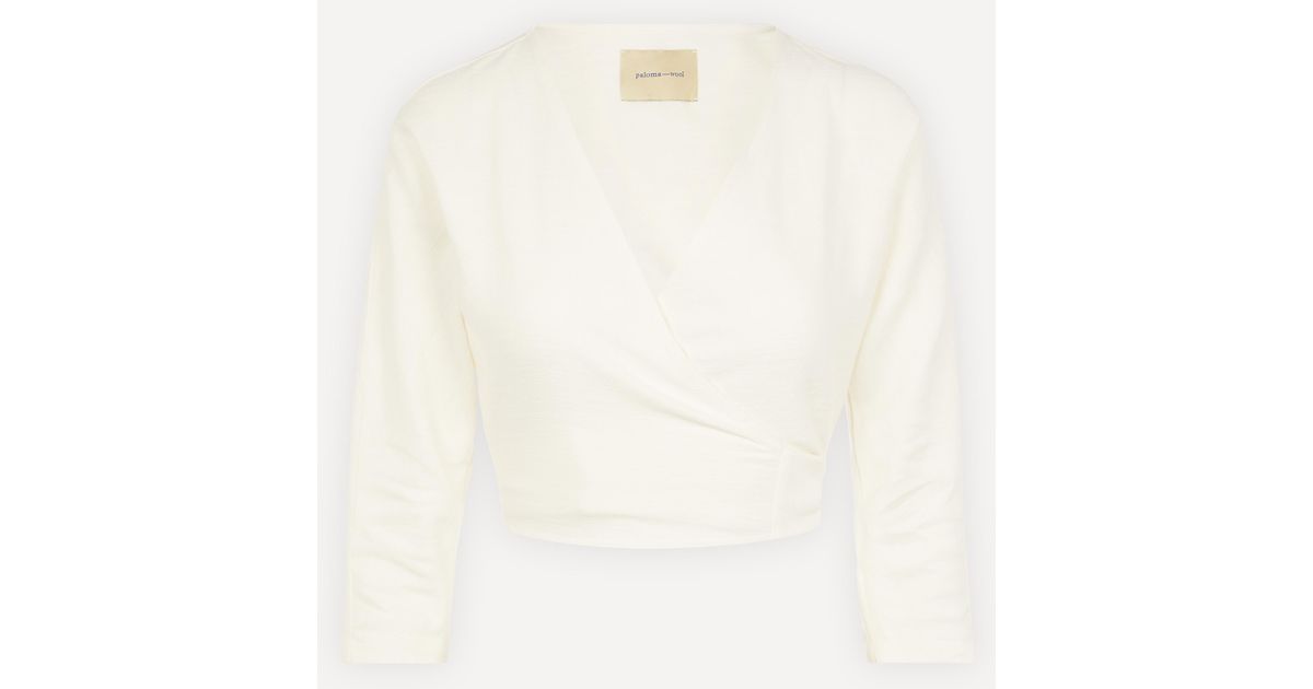white woolen top