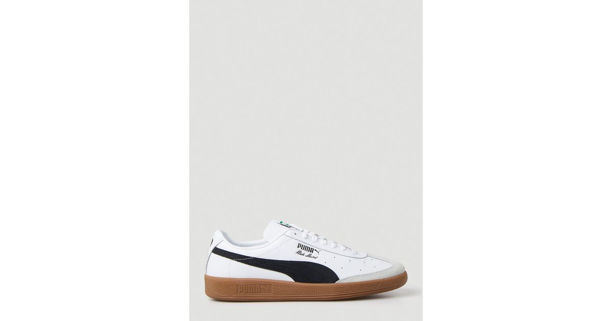 white puma with brown sole