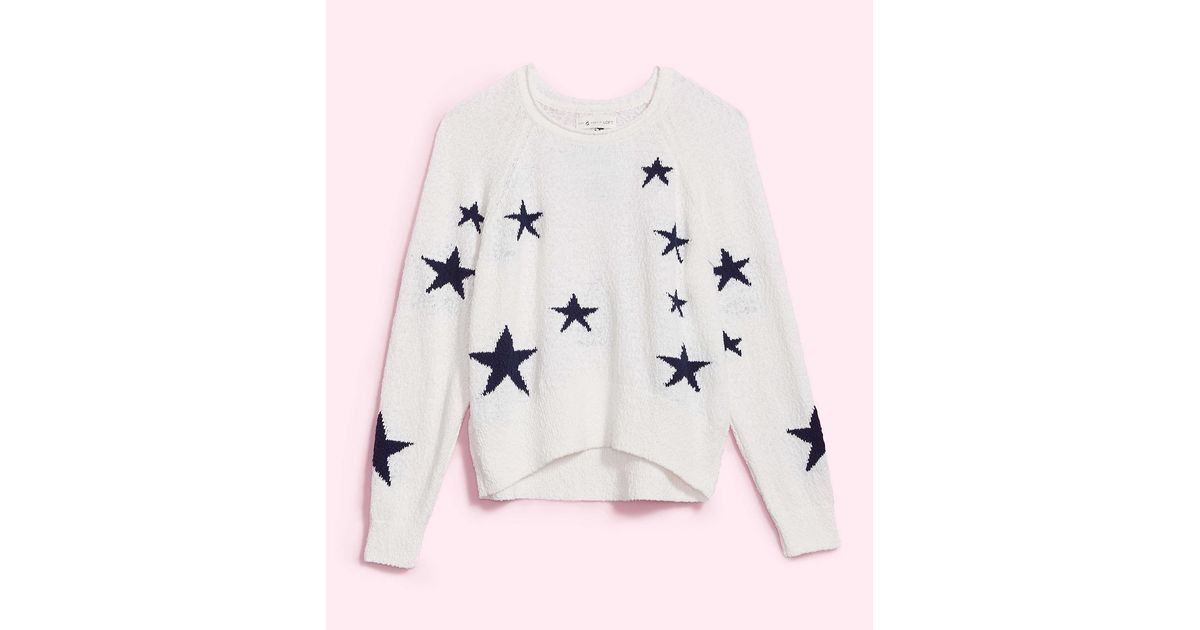 grey sweater with white stars