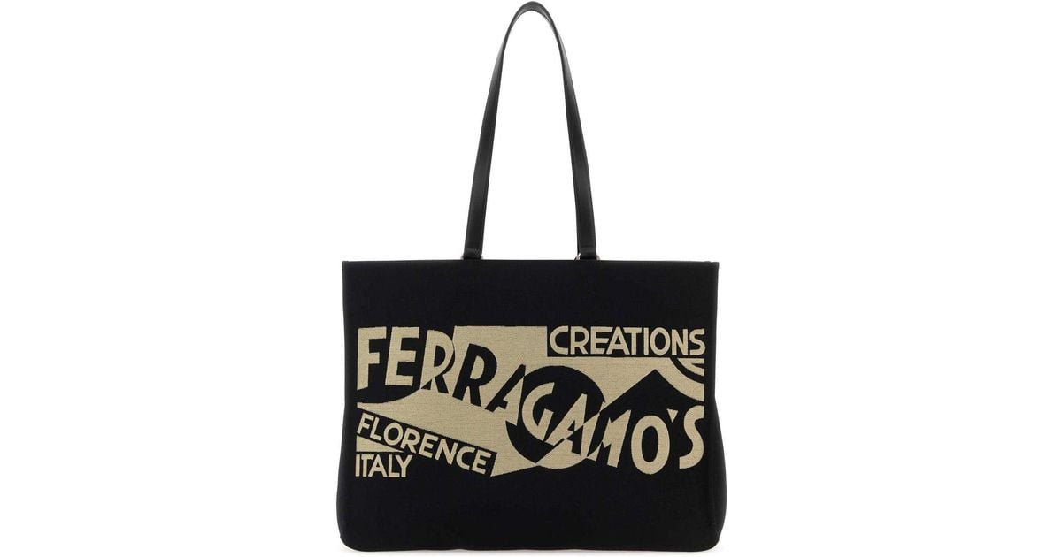 トートバッグ SALVATORE FERRAGAMO BLACK CANVAS LARGE TT SIGN SHOPPING BAG Ferragamo Black Canvas Large Tt Sign Shopping Bag | italist