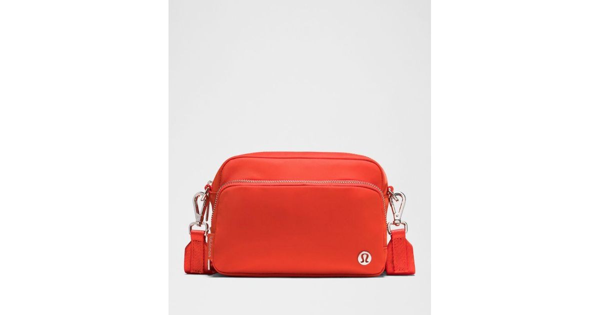 red lululemon cross body bag Everywhere Belt 1L Merlot lululemon delivers unparalleled quality and a signature aesthetic recognized globally lululemon Curved Crossbody Bag 3L
