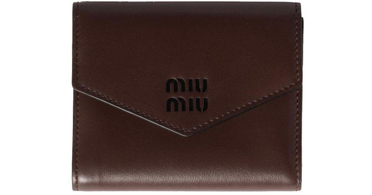 小物 MIU MIU Brown Leather Wallet Miu Miu debossed-logo Leather Wallet | Brown | FARFETCH