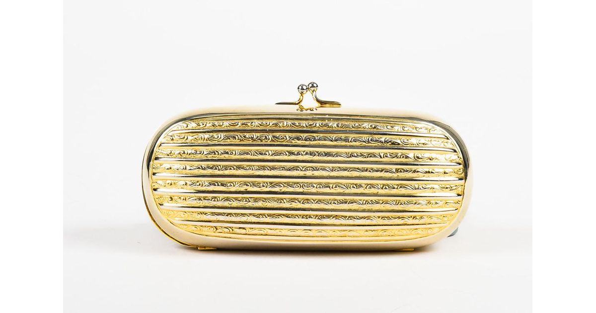 judith leiber gold clutch