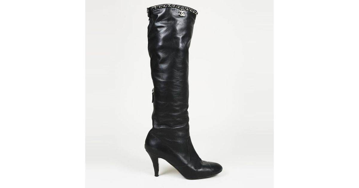 chanel chain link boots