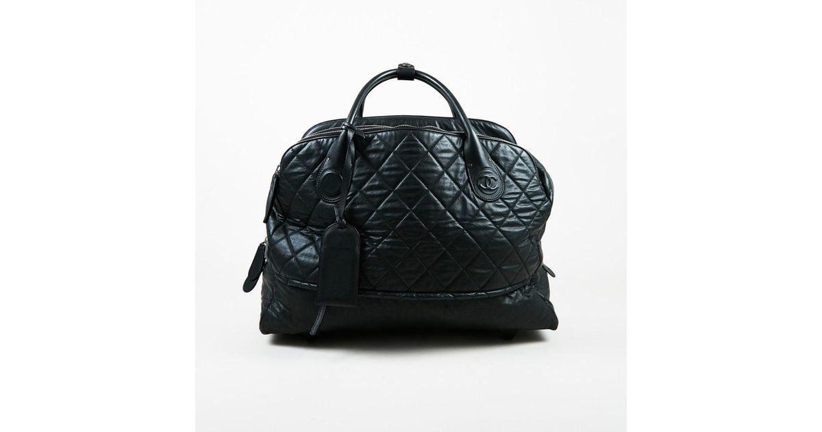 Chanel Black Quilted Multi Compartment Rolling Weekender Bag Chanel Black Quilted Multi Compartment Rolling Weekender Bag