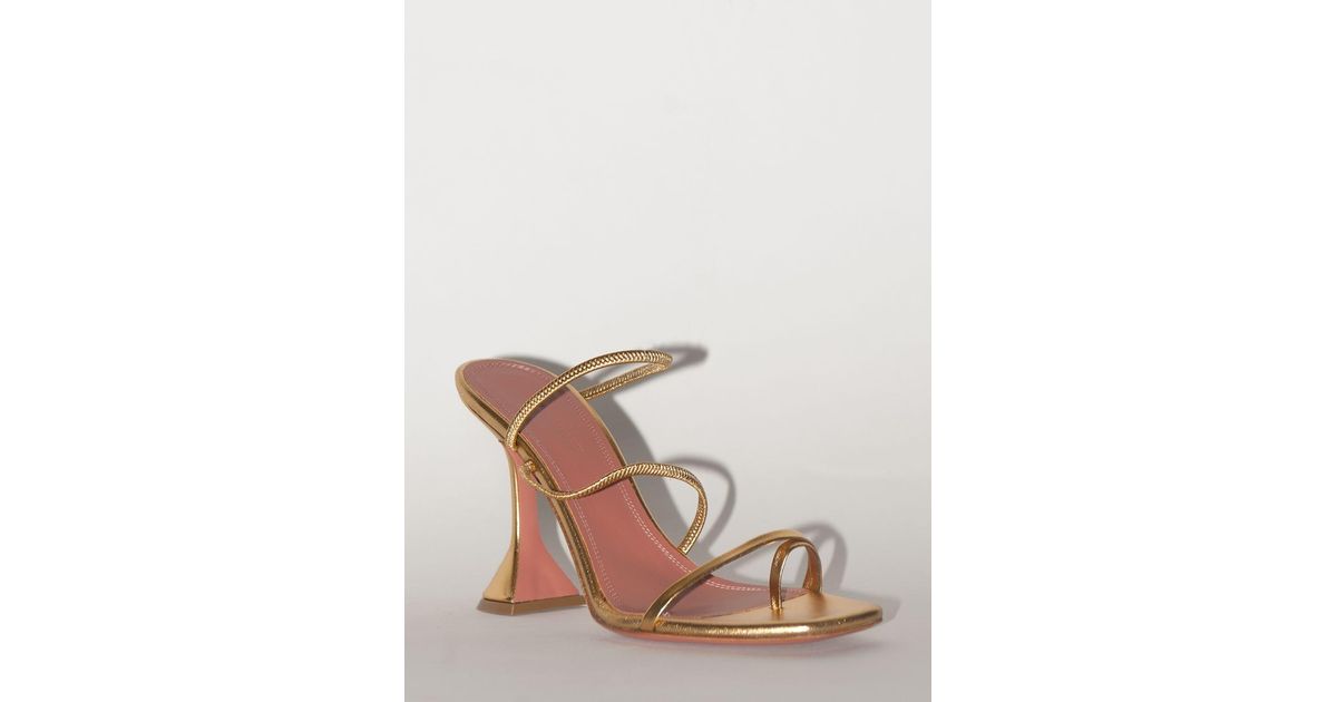 amina muaddi gold sandals