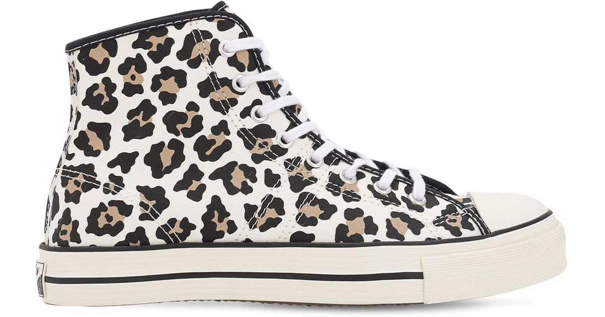 white cheetah converse