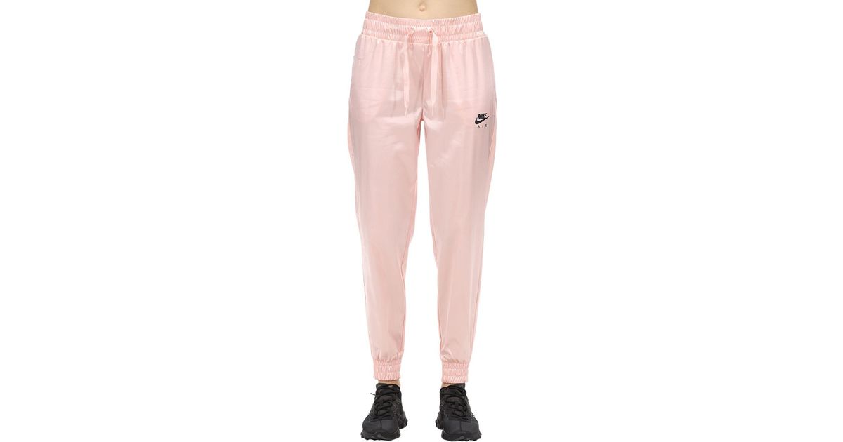 Diacrítico Del Sur Raza humana Pantalones De Satén Nike de color Rosa | Lyst