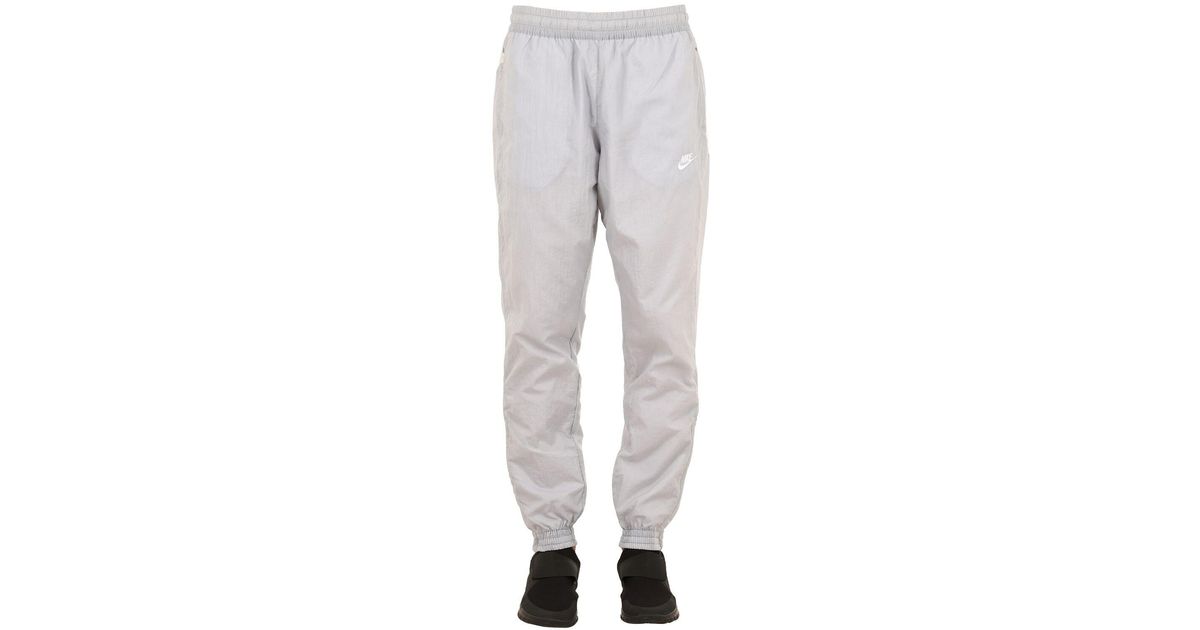 nike woven pants swoosh