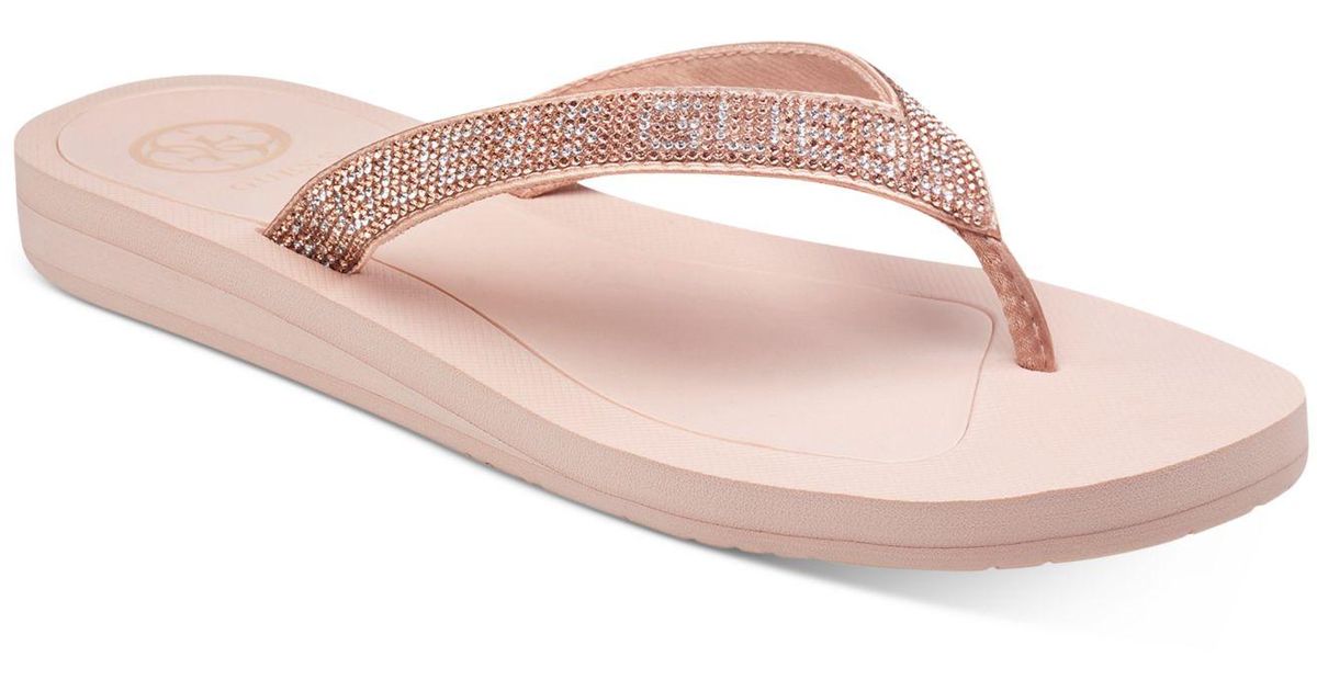 guess rose gold flip flops