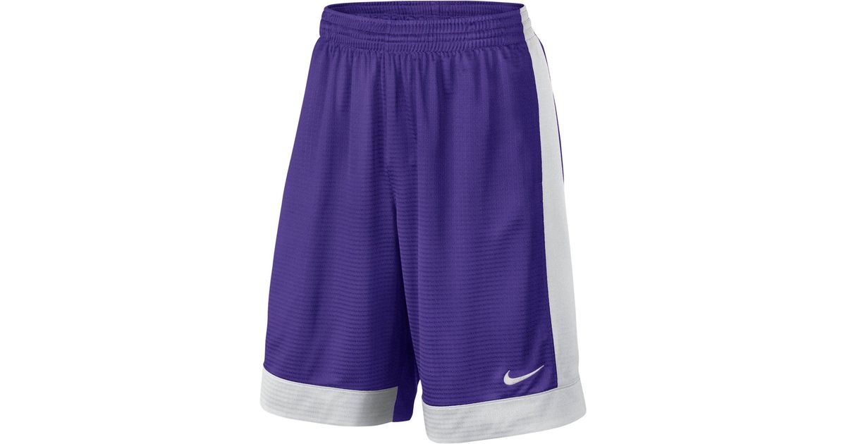 purple and white nike shorts