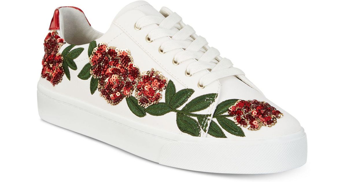 white embroidered shoes