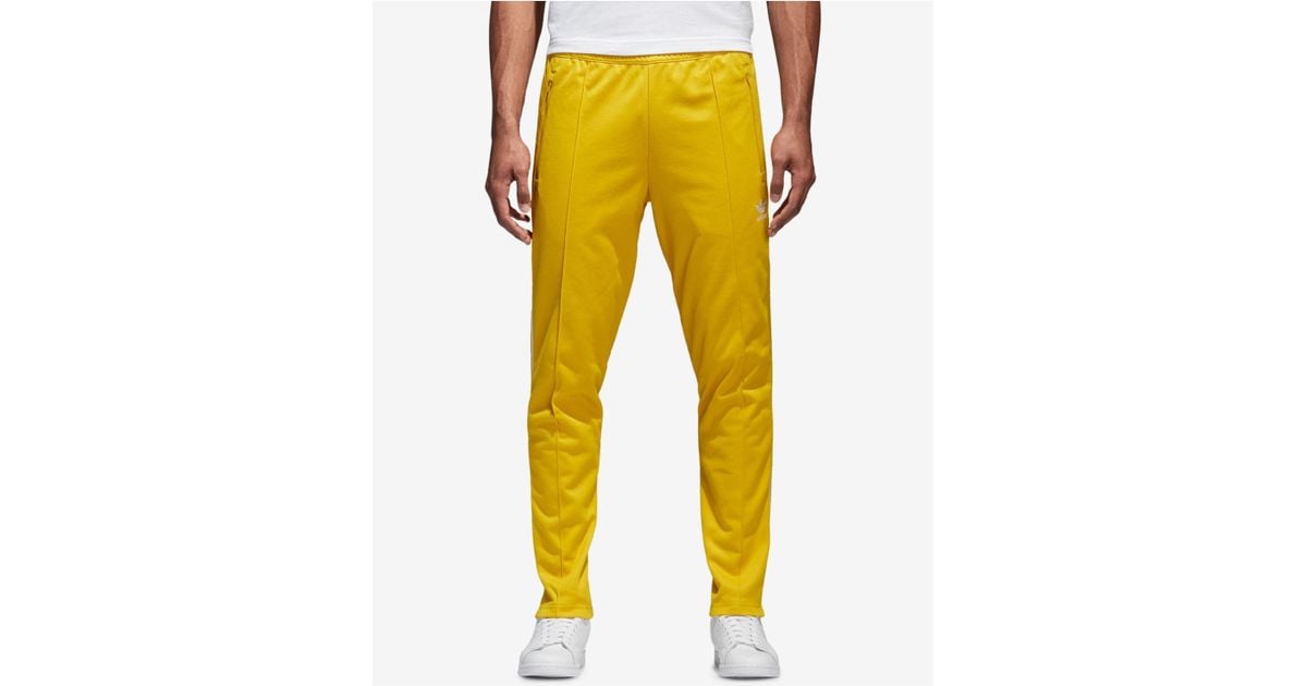 adidas beckenbauer yellow pants