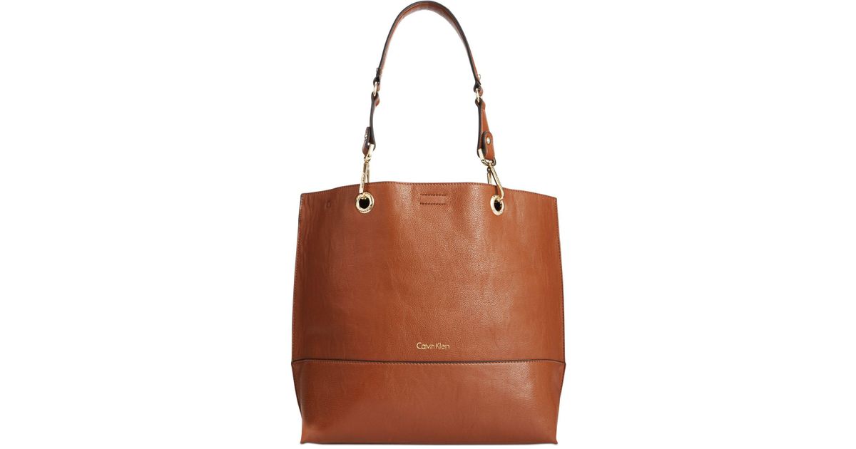 calvin klein sonoma reversible novelty tote with pouch
