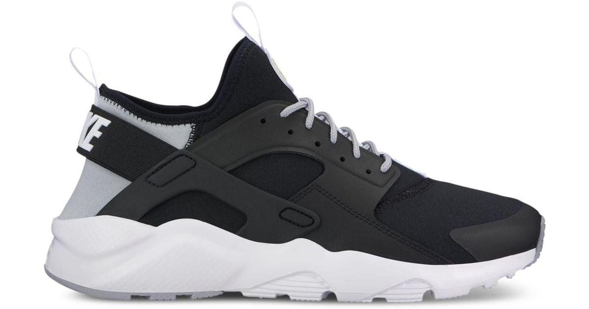 black and white huaraches finish line