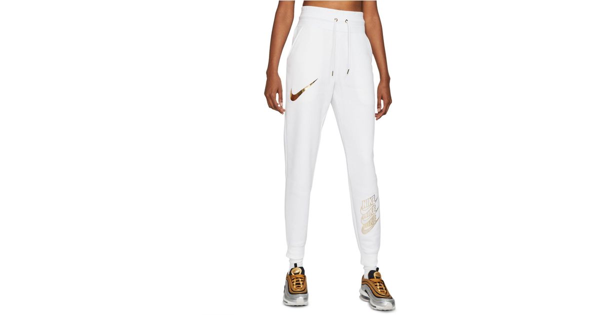 white and gold nike joggers